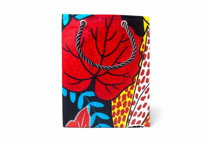 Red, black, aqua, blue, yellow, & white extra small gift bag on white background