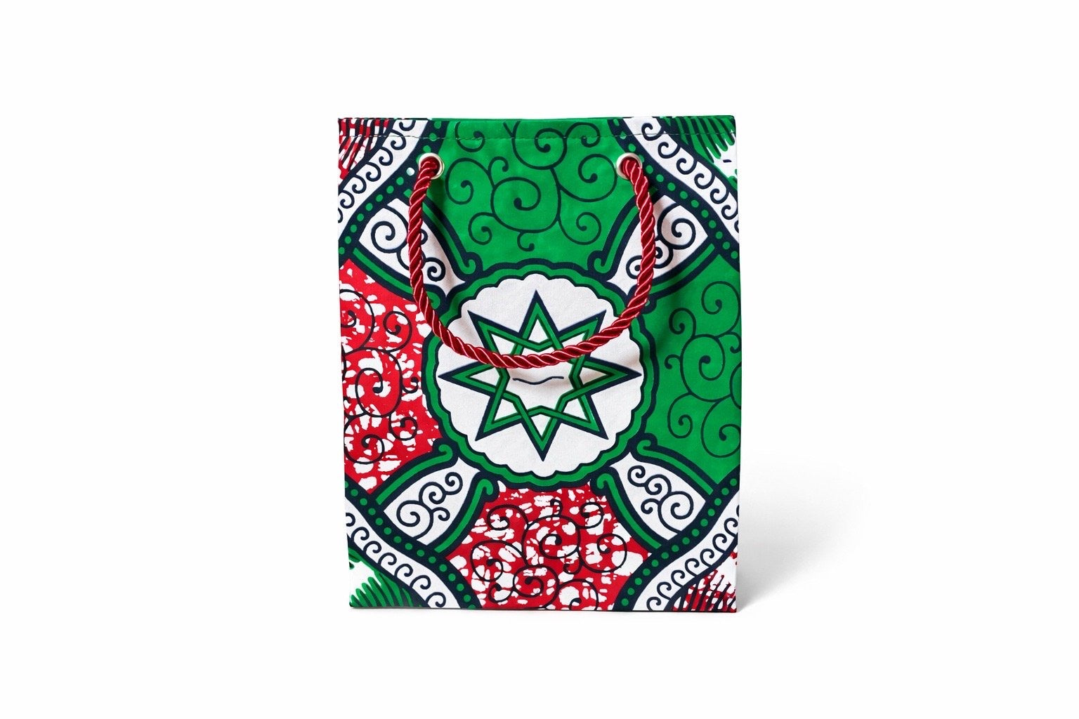 White, green, red, & black extra small gift bag on white background