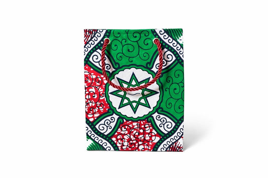 White, green, red, & black extra small gift bag on white background