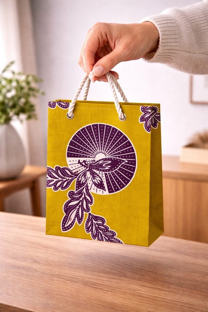 Olive green, dark brown, & white handmade African fabric extra small gift bag in lifestyle shot