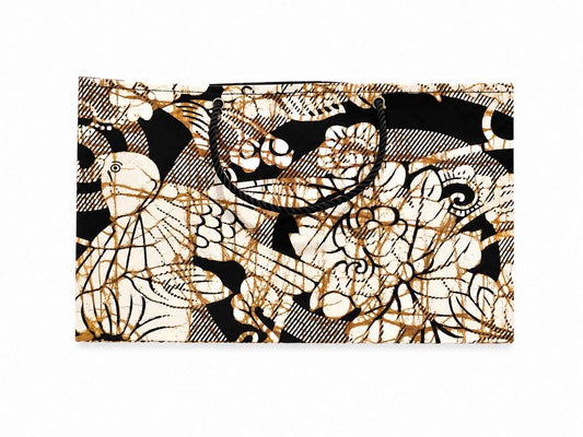 African wax print medium horizontal reusable fabric gift bag black, cream, and gold