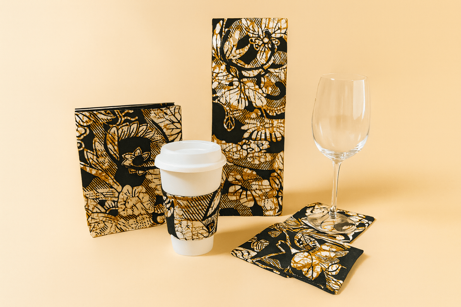 🌍 African Wax Print Cup Sleeve | Black, Cream, and Gold | Reusable Coffee Cozy | Eco - Friendly Gift ☕🌿 - Gezia Accents