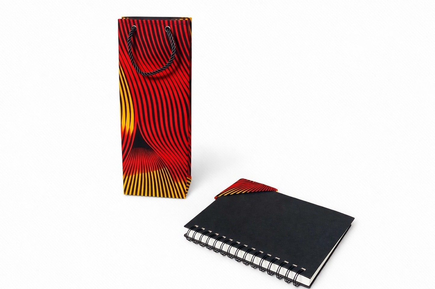 Black, red, & yellow wine bag & corner bookmark on a white background