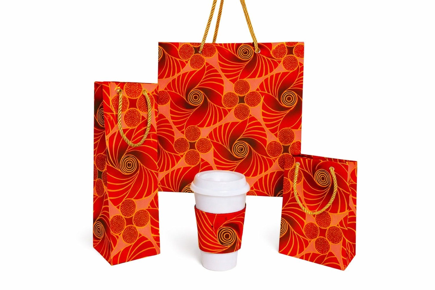 Red, maroon, pink, & gold medium bag, wine bag, & extra small gift bag and cup sleeve on a white background