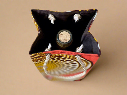 Ethnic, Fabric, Patterned, Handmade Orange, Dark Brown, Cream, and Gold Wine Gift Bag - Gezia Accents
