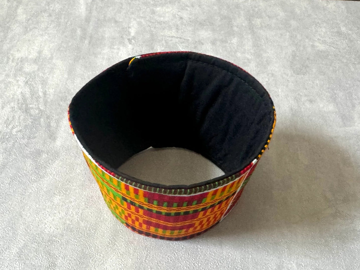 Ethnic, Fabric, Patterned, Handmade Orange, Red, Black, Green, White, and Yellow Cup Sleeve - Gezia Accents