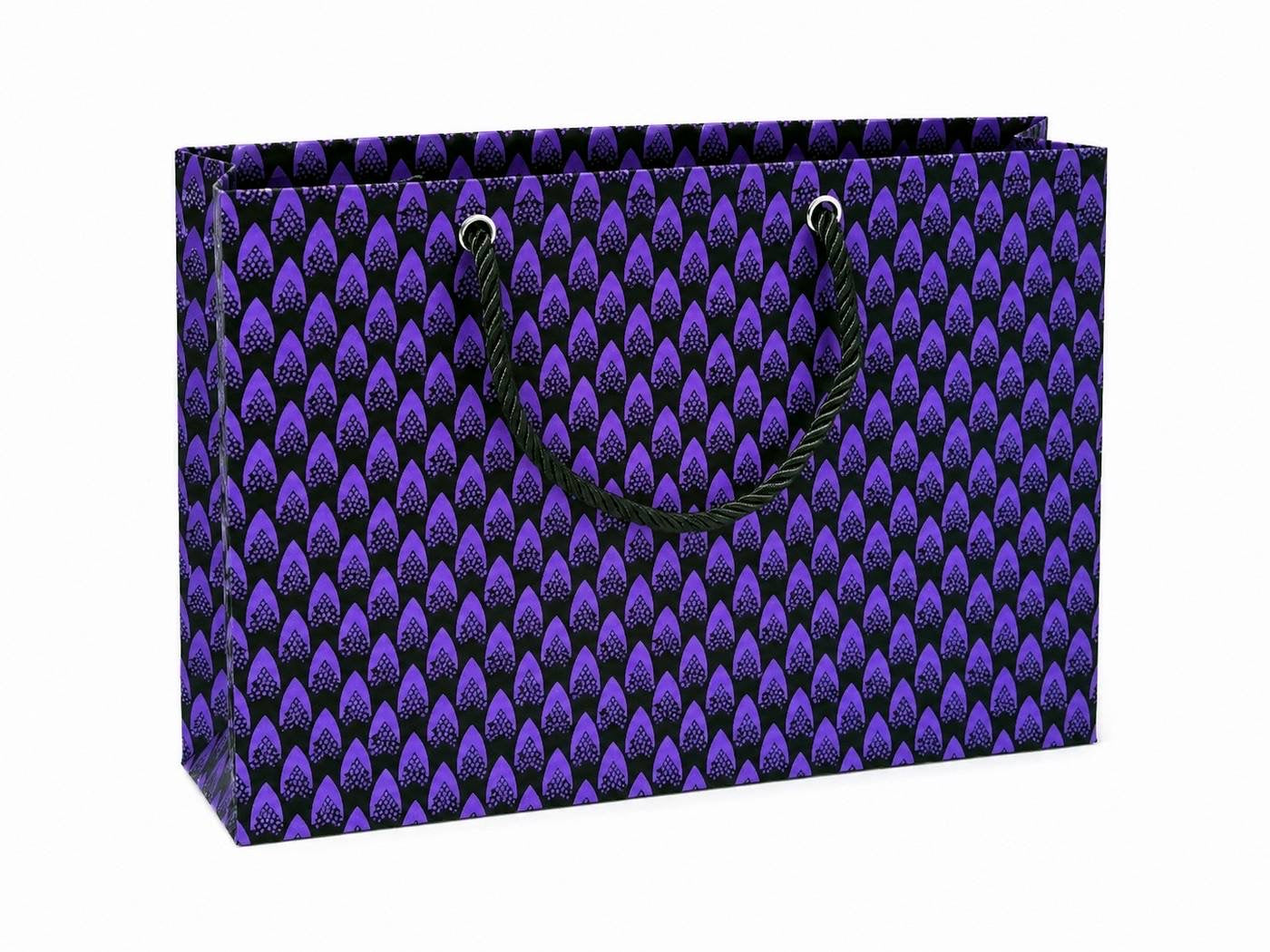 Purple and black patterned gift bag on a white background