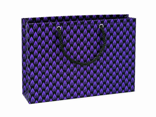 Purple and black patterned gift bag on a white background