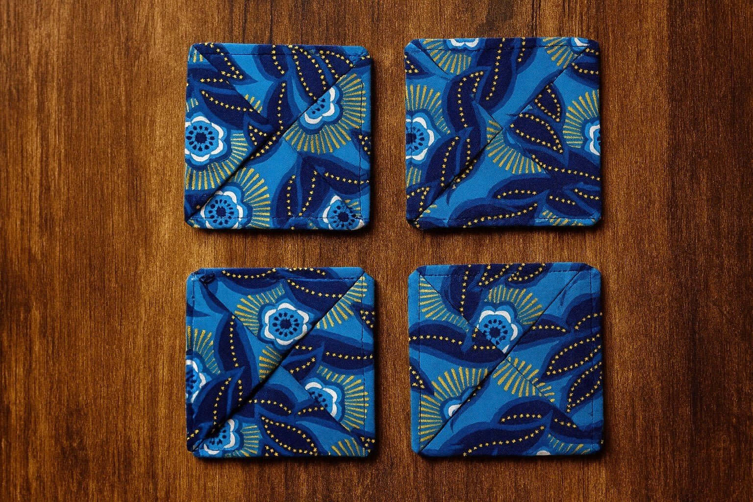 Handmade African Fabric Coasters – Set of 4 | Cultural Home Decor | Eco - Friendly Gift | Wax Print Drink Coasters - Gezia Accents